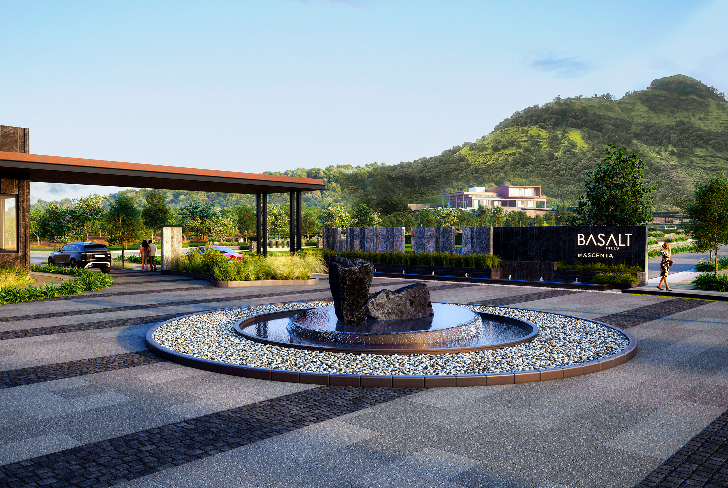 Modern stone gate and rock fountain at Basalt Hills, a luxury gated villa plot development in Karjat